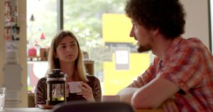 Guy and girl in a platonic relationship, enjoying coffee and one another's non-romantic company.